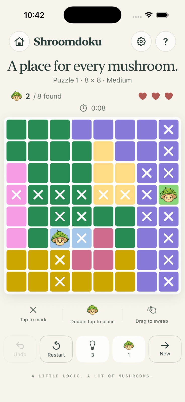 An 8 by 8 Medium puzzle with two mushrooms found, manual X notes, and three hearts.